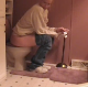 A blonde woman takes a piss and a shit in 3 scenes while sitting on a toilet. In one scene, the smell seems to attract her own dog. Audible pooping, but older video quality. About 25 minutes.
